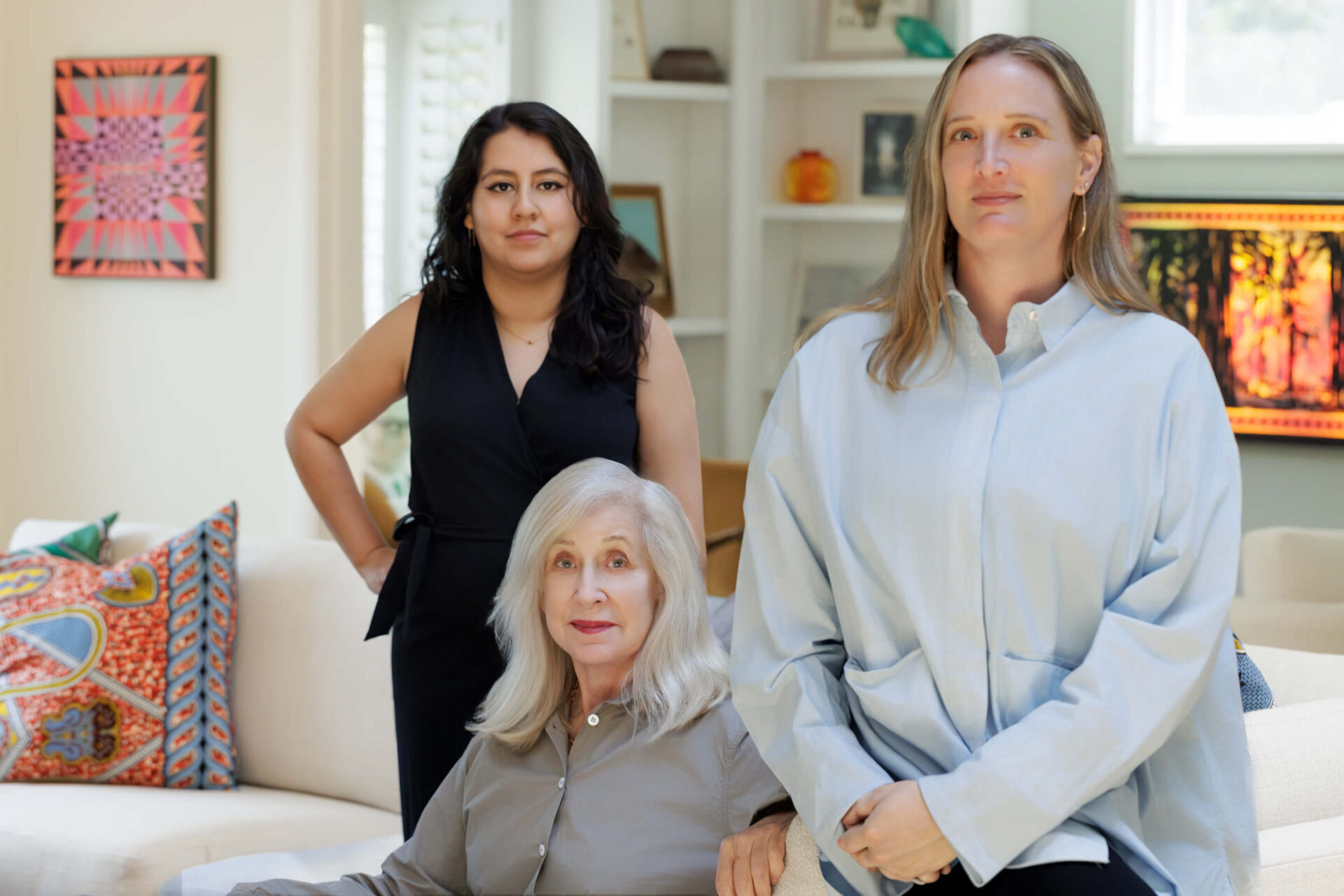 Cecilia Dan and her team of art advisors at Cecilia Dan Fine Art, Megan Dudley and Natalie Henriquez
